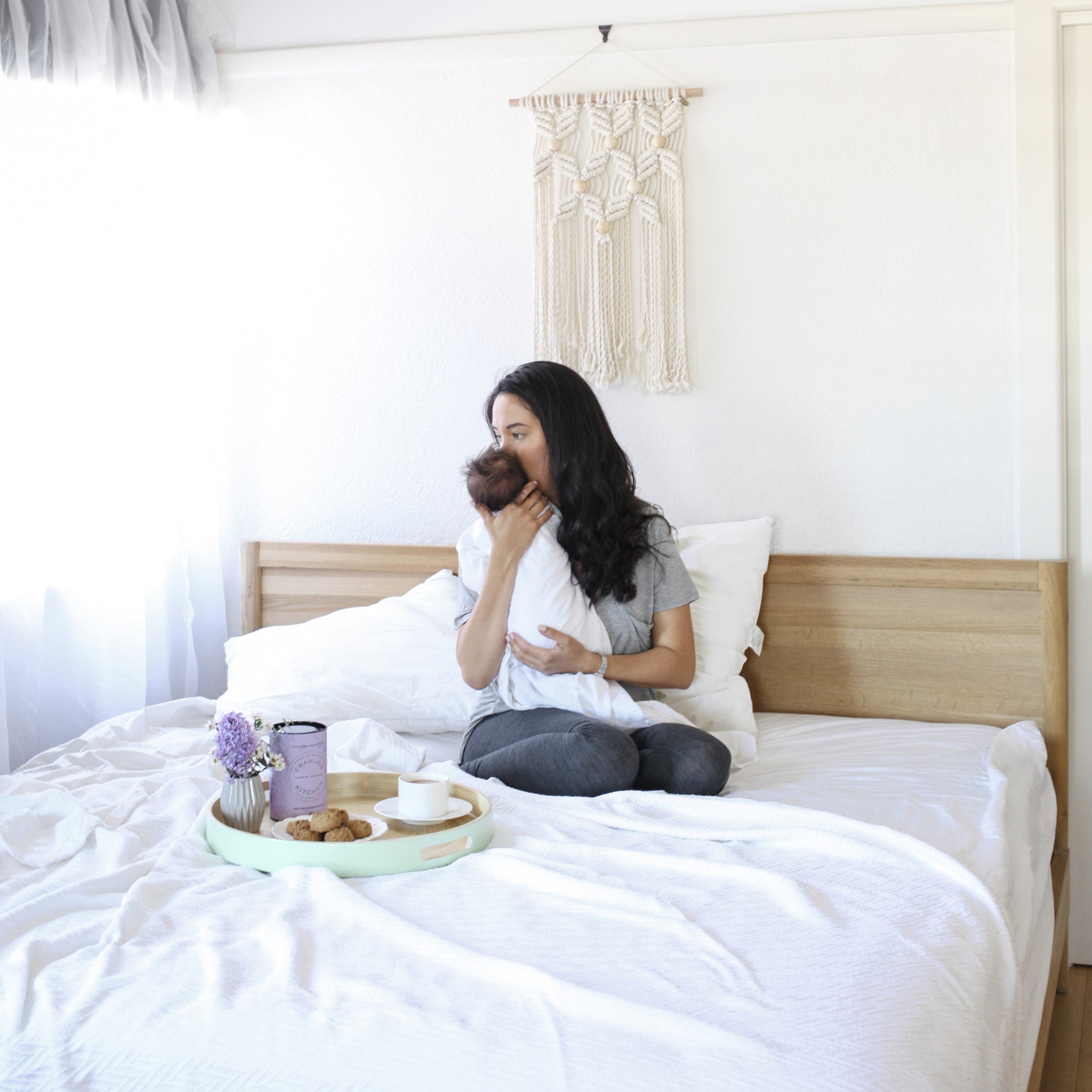 Motherhood - Mother in bed with baby